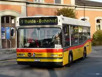 Postauto -  Neoplan  AG 8283 unterwegs auf der Linie 1 in Wohlen am 22.04.2010