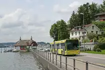 Der Mercedes-Benz O 530 G  Citaro  Nr. 143 am 1. Juni 2010 bei der Schiffl�nde Seeburg. Wenn man genau hinsieht kann man im Hintergrund das KKL und die Hofkirche entdecken.