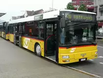 Postauto - MAN  AG 6449 bei den Bushaltestellen beim Bahnhof Brugg am 20.05.2010