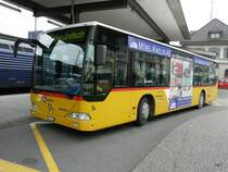 Postauto - Mercedes Citaro AG 100556 bei den Bushaltestellen beim Bahnhof Brugg am 20.05.2010