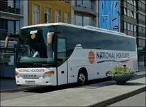 Dieser britische Reisebus Setra S 415 GT HD ist mir am 11.08.2010 in Oostende vor die Linse gefahren.