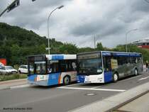 Solaris Urbino un MAN Lions City am Saarbrcker Rmerkastel.
