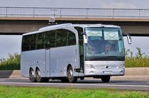Mercedes Reisebus auf der A61 bei Miel 23.09.2010