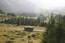 Blick takwrts auf das Dorf Grindelwald, wo der abendliche Nebel langsam entsteht. Aufnahme mit bergfahrendem MAN am 9.10.10. 