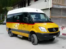 Postauto - Mercedes 515 CDI 4x4  GR 158838 vor dem Bahnhof Bever am 14.09.2010