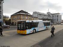 Postauto/PU Stutz Nr. 216 ''Einkaufszentrum Zugerland'' (MAN Lion's City A20) am 11.12.2010 beim Bhf. Affoltern am Albis.