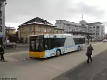 Postauto/PU Stutz Nr. 216 ''Einkaufszentrum Zugerland'' (MAN Lion's City A20) am 11.12.2010 beim Bhf. Affoltern am Albis.