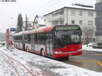 Stadtbus Winterthur Nr. 335 (Solaris Urbino 18) beim Guggenb�hl am 24.12.2010.