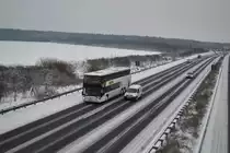 Van Hool Reisebus auf der A2 bei Lehrte, am 19.12.2010.