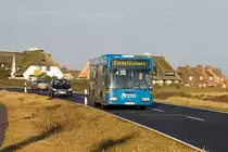 Am ersten Tag des Jahres war der NF-CN 883 der SVG als Verstrkerbus auf der Linie 2 zwischen Westerland und Rantum im Einsatz. Nur noch wenige Meter hat der O405NK bis zum ersten Parkplatz sdlich von Rantum, wo der Bus auf die Rckfahrt nach Westerland wartet.