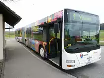 MAN Lion's City Wagen Nr: 151 bei der Haltestelle Bettlen in W�renlos. Mit einer farbigen Vollwerbung.