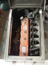 Der Motor des kleinen grnen Busses ein japanisches Fabrikat. (15.02.2011)