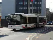 AAR - Scania-Hess Nr.164 AG 114464 unterwegs auf der Linie 1 bei der zufahrt zu der Bushaltestelle vor dem Bahnhof in der Stadt Aarau am 05.02.2011