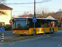 Postauto - Schnappschuss vom Mercedes Citaro  BE 26613 unterwegs auf der Linie 86 in Nidau am 07.02.2011