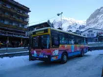 AVG Grindelwald Nr. 19/BE 363'305 Vetter am 31. Dezember 2010 Grindelwald, Bahnhof (mit Vollwerbung als  Coccolino-Bus )