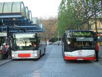 Rechts Bogestra Solaris Urbino 12,Dienstfahrt,Werbetr�ger von
Heinen Brillen,liks ein MAN ,Wagen 9807 der Bogestra ,im
Bochumer Hbf/Bbf.(18.11.2007)