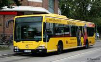 Hochbahn 6405 (HH HN 2555) macht Werbung fr Dumrath und Fassnacht.
Aufgenommen am Eppendorf Markt, 21.8.2010.
