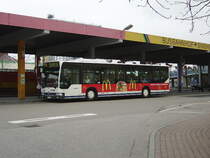 Ein SWEG Citaro mit Mc Donalds Werbung am 18.03.11 in Sinsheim Hbf