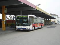 Ein SWEG Citaro mit Mc Doff Werbung in Sinsheim Hbf am 18.03.11