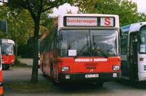 MAN SL202 von Wessels Reisen, aufgenommen auf dem Parkplatz der Wesfalenhallen in Dortmund.