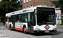 VHH 0408 (HH JT 1736) mit Werbung fr Reifen Helm.
Aufgenommen am Bahnhof Bergedorf, 2.9.2010.
