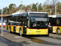 Postauto - MAN Lion`s City ZH 780683 bei den Bushaltestellen beim Bahnhof in B�lach am 01.04.2011


