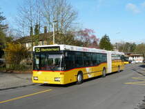 Postauto - Mercedes O 405 GN ZH 780687 beim Bahnhof in B�lach am 01.04.2011
