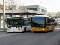 Schaffhausen Bus / Postauto - Mercedes Citaro SH 54323 und SH 917 bei den Bushaltestellen beim Bahnhof in Schaffhausen am 01.04.2011