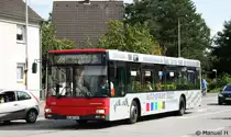 Rheinbahn 7334 (D XN 7334) mit Werbung f�r Auto-Pausen.
Aufgenommen am ZOB Monheim, 11.9.2010.
