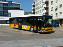 Postauto - Setra S 315 NF  JU 21773 bei den Bushaltestellen bei der Post in Delemont am 16.04.2011

