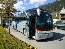 Jacky Voyages, Ch�teau-d'Oex - VD 735 - Setra am 30. April 2011 beim Bahnhof Zweisimmen