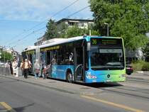 Mercedes Citaro Hybrid mit der Betriebsnummer 736 an der Haltestelle Zoo Dorenbach in Basel. Die Aufnahme stammt vom 09.05.2011.