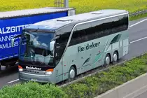 Setra S 400er Top Class EvoBus  Heidecker  auf der A61 bei Miel - 03.05.2011
