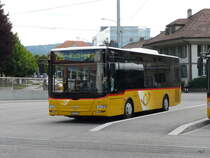 Postauto - MAN Lion`s City  BE 461217 unterwegs auf der Linie 795 bei den Postautohaltestellen beim Bahnhof Worb RBS am 28.05.2011