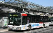Mbus 0703 mit Werbung fr Paul Langen. 
Aufgenommen am HBF Mnchengladbach, 6.3.2011.