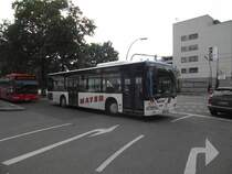 Ein Mercedes Benz Citaro von Mayer in Heidelberg am 01.07.11 mit Deutschland Fhnchen 