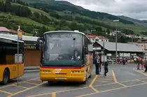Ein Neoplan Postauto am 14. August 2010 als Linie 923 (Sent - Sur En) in Scuol-Tarasp.