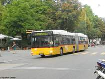 Postauto/PU Motrag Nr. 163 (MAN A23) am 31.8.2011 bei der Haltestelle Schmidgasse. Der Wagen wurde an diesem Abend als Entlastungskurs zwischen Winterthur und Neftenbach eingesetzt.
