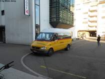 Postauto/Regie Delmont JU 36947 (Mercedes Sprinter 413CDI) am 29.11.2011 beim Bhf. Delmont. 