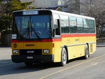 Postauto - NAW / BE 401 364  bei der Postauto Haltestelle in Meiringen am 17.02.2008