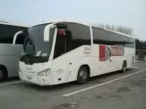 Scania Irizar de l'entreprise Realitours (Italie) avec graphique Maximo photographi� le 02.02.2012 sur l'aire du restauroute de Payerne (Suisse)