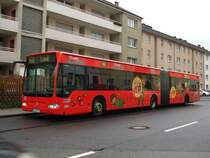 MB O 530 G Citaro facelifted K-VB 733 mit der recht neuen Werbung fr Kinder Em-eukal am 16.02.2012, Porz - Antoniusstrasse
