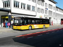 Postauto - MAN Lion`s City  SG 304023 bei Bahnhof Herisau am 01.03.2012