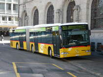 Postauto - Mercedes Citaro  TG 38838 bei den Postautohaltestellen vor dem Bahnhof in St.allen am 01.03.2012