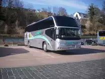 Neoplan Cityliner aus Deutschland im Stadthafen von Sassnitz am 06.04.2012