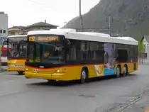 Postauto - Scania-Hess  VS 32092 auf dem Bahnhofsplatz in Brig am 08.04.2012
