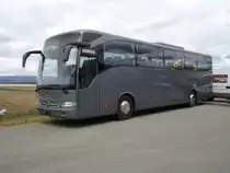 Mercedes-Benz Tourisme ex-Xamax (club de football en faillite) photographi� le 21.04.2012 devant le garage Interbus � Kerzers
. Ce v�hicule qui est pratiquement neuf (moins d'une ann�e) �tait noir -feuilles auto-collantes-, un reste de d�coration est encore visible sur les vitres lat�rales

. Ce bus appartient maintenant � la maison DOMO Reisen