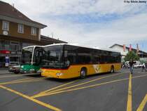 CarPostal/PU SAPJV Nr. 64 (Mercedes CitaroII O530LE) am 5.6.2012 beim Bhf. Morges.