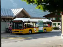 Postauto - Volvo 7700 Hybrid  BE 610542 bei der Haltestelle beim Bahnhof Wilderswil am 16.06.2012