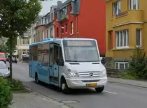 Auf dem Warken Rundkurs ist dieser Citybus der Marke Mercedes mit Kutsentisaufbau in den Stra�en von Ettelbr�ck unterwegs. 29.06.2012